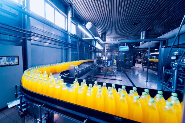 Beverage,Factory,Interior.,Conveyor,With,Bottles,For,Juice,Or,Water.
